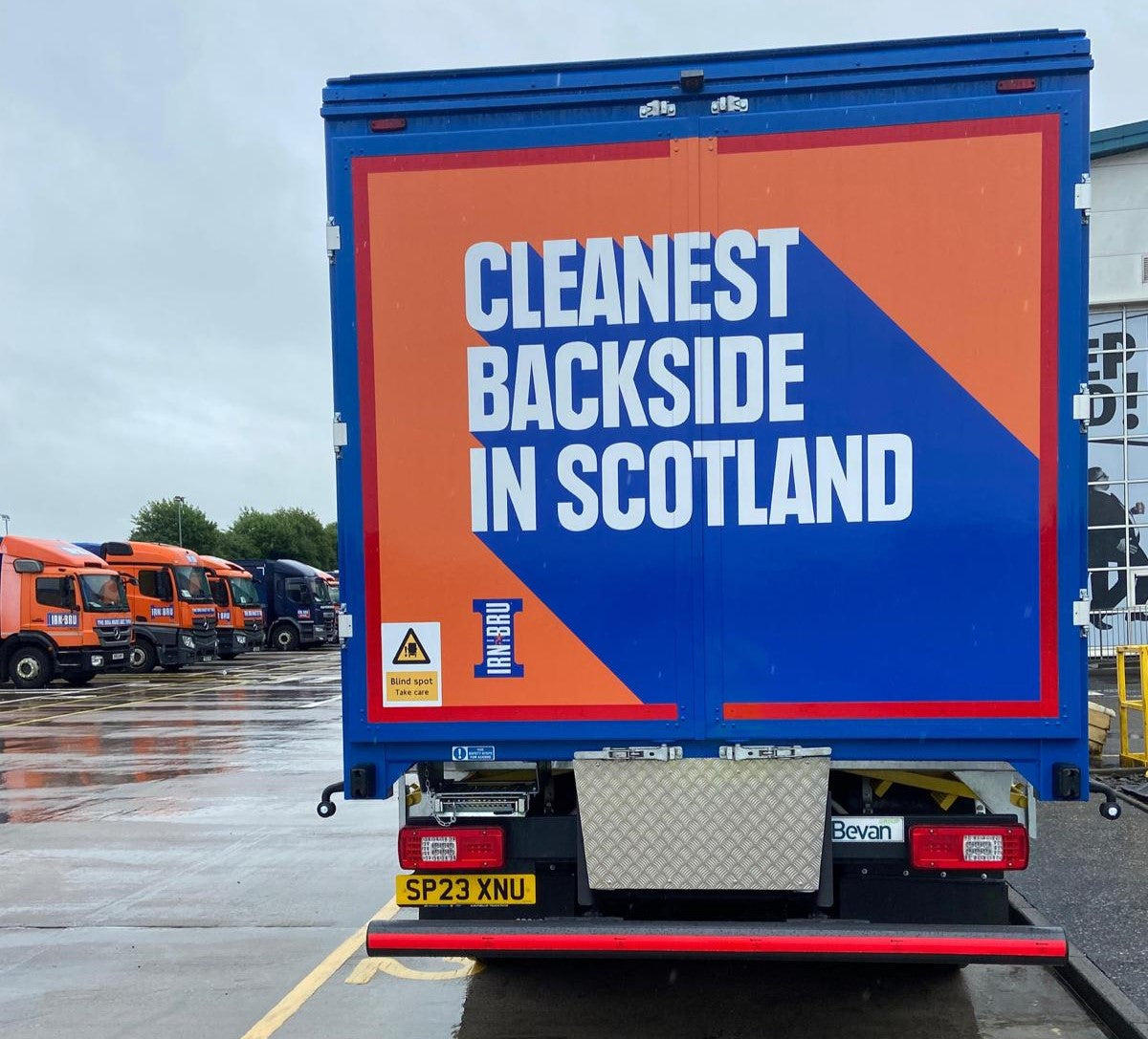 The back of an IRN-BRU truck with the text "Cleanest Backside in Scotland"
