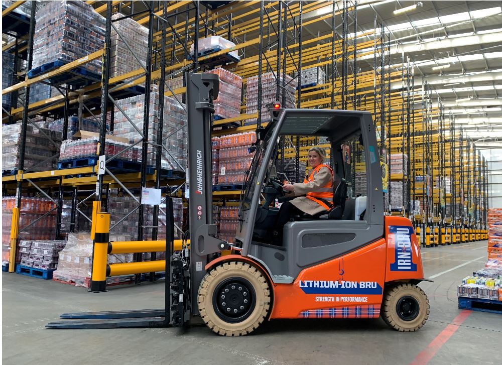 Electric forklift in a warehouse